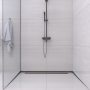 Balneo vágható inox lejtést beállító léc 120 cm, balos/matt fekete D0101020210-1