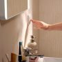 Hansgrohe Xarita Lite Q Tükör függőleges irányú LED világítással 80x70 fali kapcsolóhoz, matt fehér 54963700