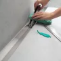 Hansgrohe RainDrain Flex oldalfal mellé zuhanylefolyó 120 cm, vágható, matt fekete 56054670