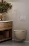 Invena Tavro csendes öblítésű fali kerámia WC csésze Soft-Close és könnyen levehető ülőkével, matt cappuccino kivitelben.