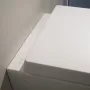Laufen Pro X csendes öblítésű fali kerámia WC csésze LCC bevonattal és Duroplast ülőkével, fehér kivitelben.