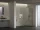 Ravak Walk-In Air Wall 90 zuhanyfal átlátszó üveggel és merevítővel, matt fekete profilszín GW9W70300Z1