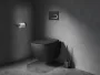 Matt fekete fali WC papír tartó letisztult, modern fürdőszobai megjelenéssel.